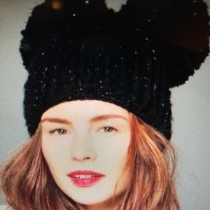 Knitted beanie with double pom pom detailing